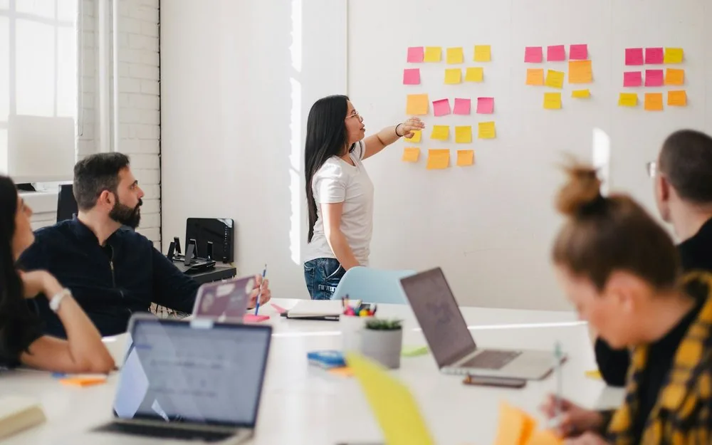 Team reviewing financial reports on a shared screen