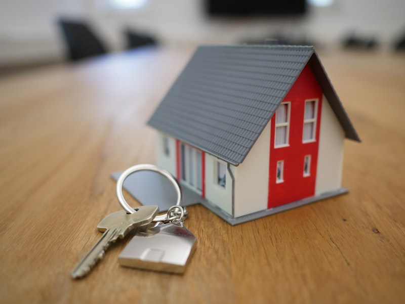 Real estate professionals reviewing property documents
